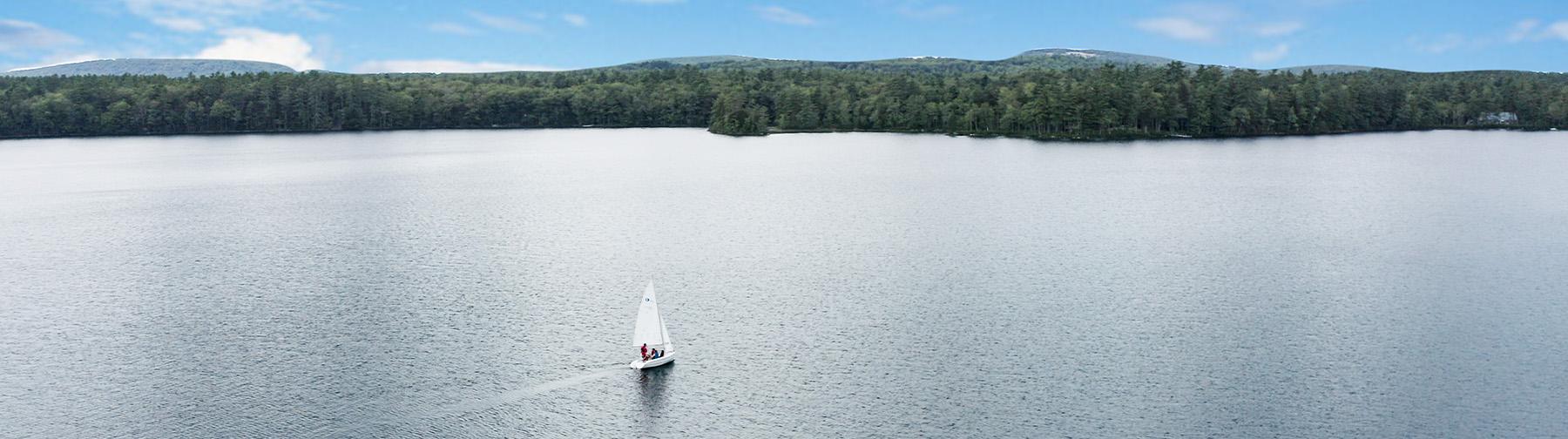 sailboat-on-medomak-lake-aerial